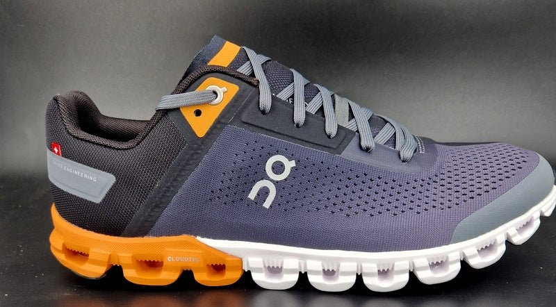 On Running Cloudflow Black/Turmeric men - Winzer Gesunde Schuhe